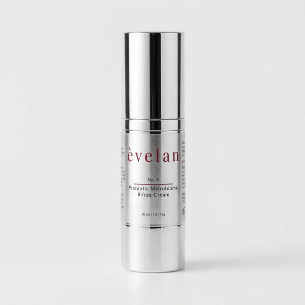 Silver skincare cream bottle with 'évelan' branding on a white background