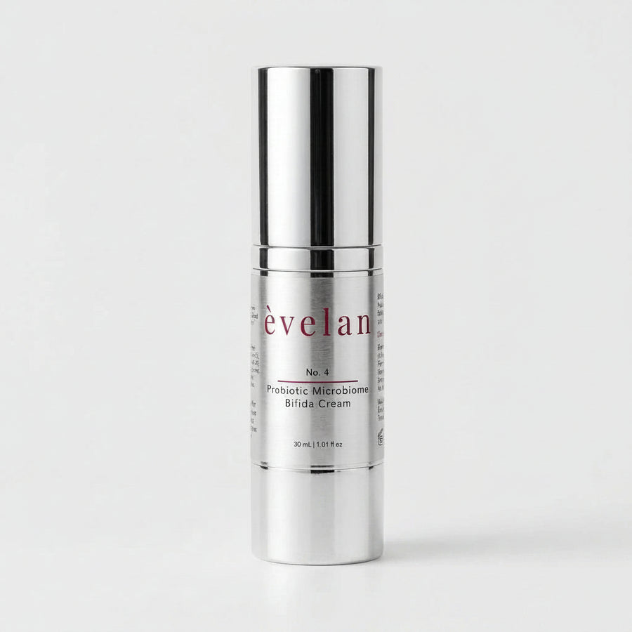 Silver skincare cream bottle with 'évelan' branding on a white background